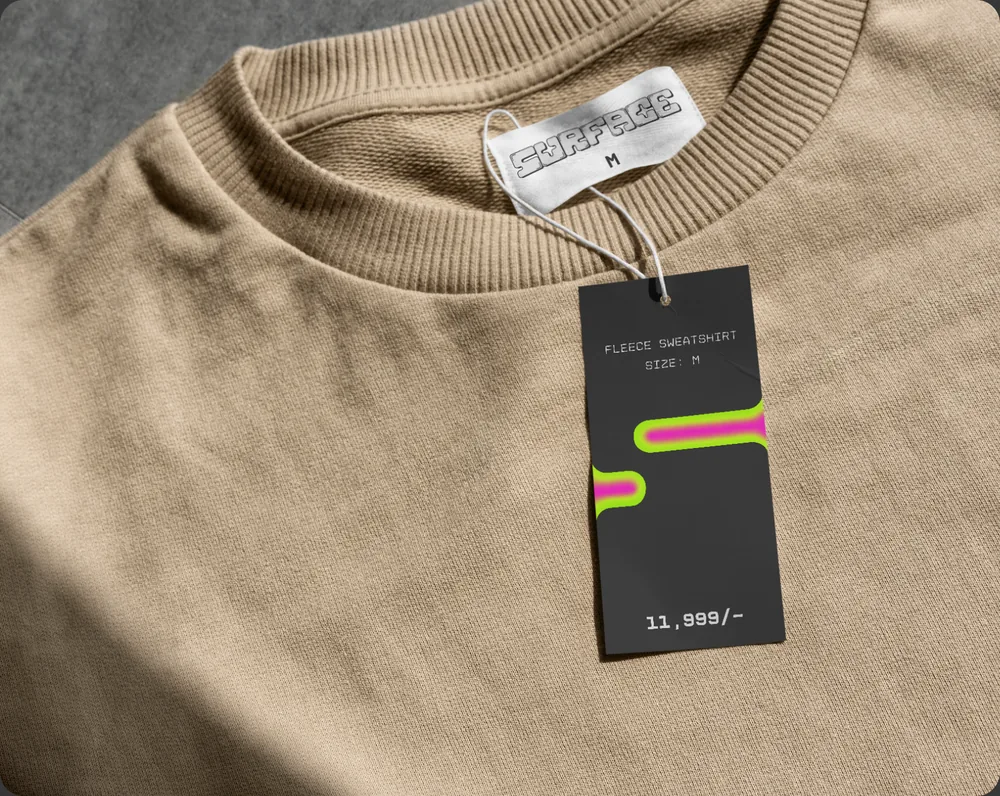 Clothing tags on a garment.