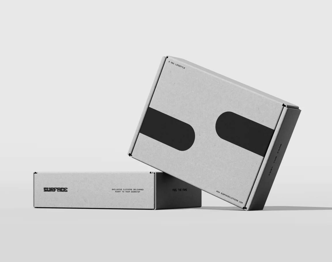 Two Surface boxes printed with the S mark.